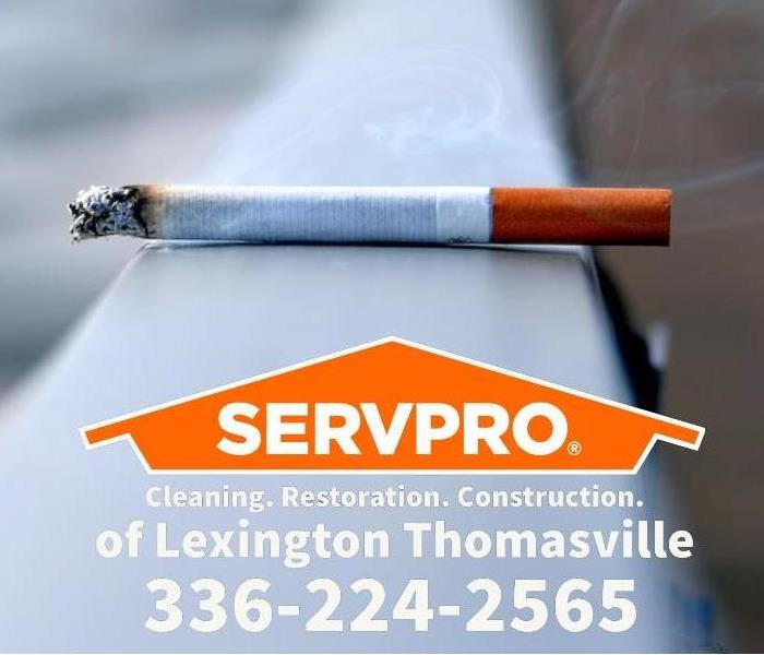 Cigarette burning with SERVPRO logo