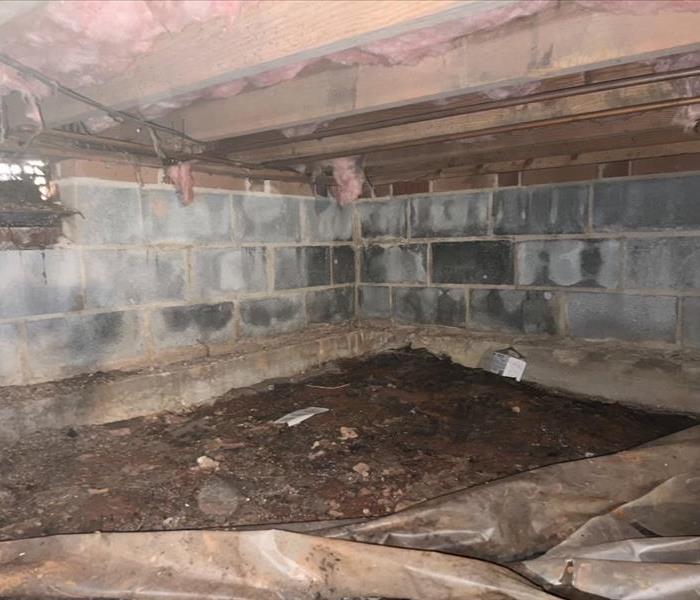 Water damage in a crawlspace. 